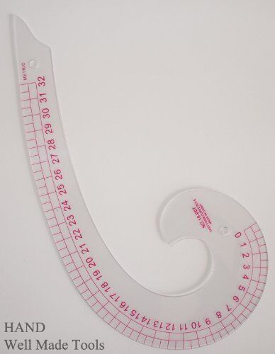 Close-up of the curve ruler demonstrating its shape and design.