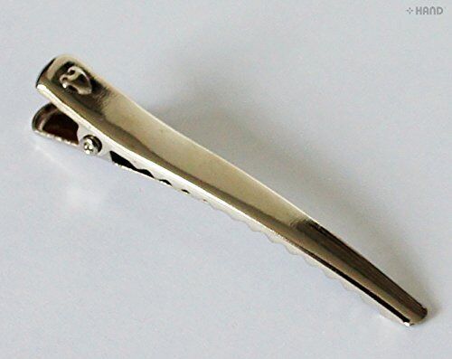 Alligator hair clips arranged neatly, highlighting their 6cm size