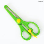 Child using the blunt tip scissors for crafting
