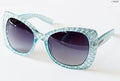 Two pairs of retro sunglasses in assorted colours on a white background.