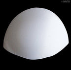 Close-up view of the soft texture of the white bra pads.