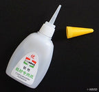 Close-up of B502 Super Glue tube for shoe repairs