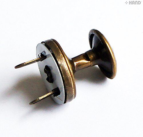 Different angles of vintage gold magnetic press studs displayed.