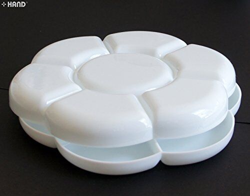 Two white plastic paint trays stacked together for easy storage.