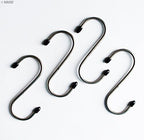 Close-up of rubber ends on stainless steel S-hook