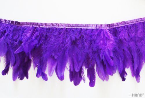 Close-up of purple double layer duck feather trim, 6 inches wide.