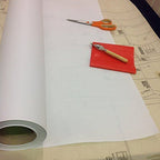Close-up of the adhesive side of the tracing paper roll.