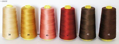 Assorted cold colour polyester threads in spools