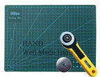 A3 cutting mat on a work surface with fabric and tools