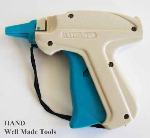 Close-up of the tagging gun's trigger and attachment mechanism