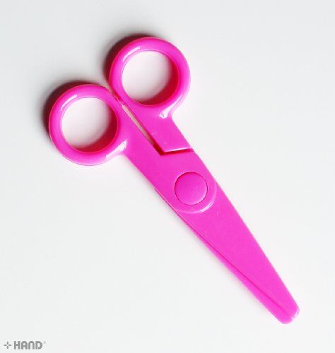 Close-up of the assorted colours of safety plastic scissors for kids.