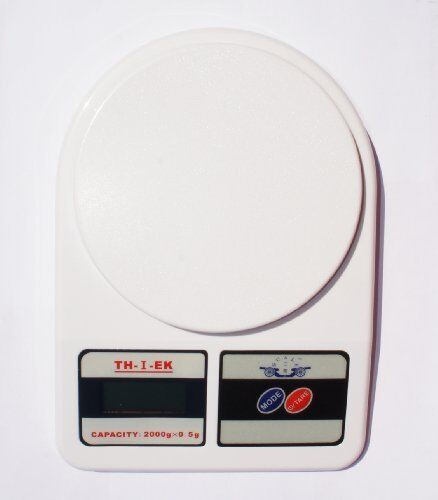 Scale dimensions displayed alongside the postal scale.