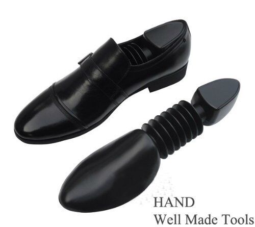 Shoe stretchers placed inside a pair of shoes