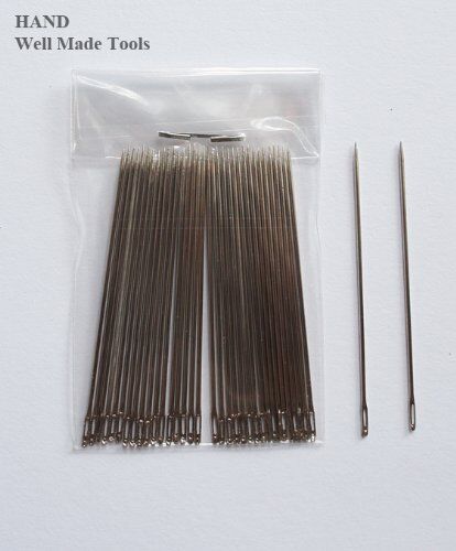 Close-up of a 4.3cm thin sewing needle showing the sharp pointed end.
