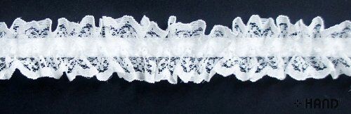 Close-up of white nylon ruffle lace trim with tinsels