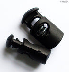 Different angles of oval plastic toggle spring stop cord locks