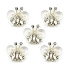 Clear diamante and crystal flower felt sew-on trim on display.