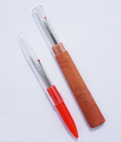 Close-up of the unpicker showing the sharp blade and handle.