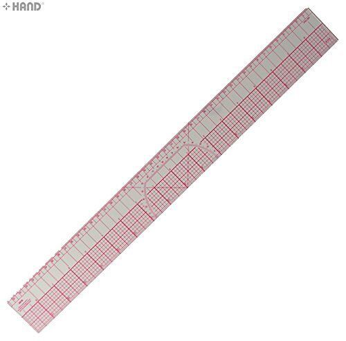 B95 grader ruler in a sewing workspace with fabric