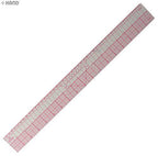 B95 grader ruler in a sewing workspace with fabric