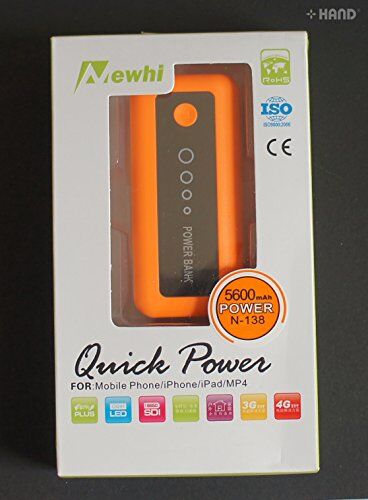 User holding the external battery charger outdoors