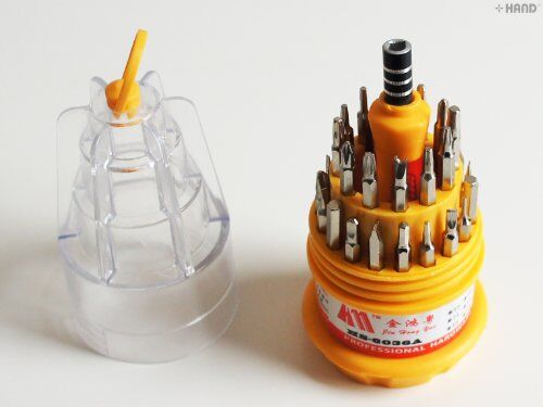 All components of the 31-in-1 tool set arranged neatly