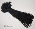 Black nylon string round snap lock hang tags in a pack