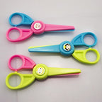 Side view showing the 12 cm length of the children's safety scissors.