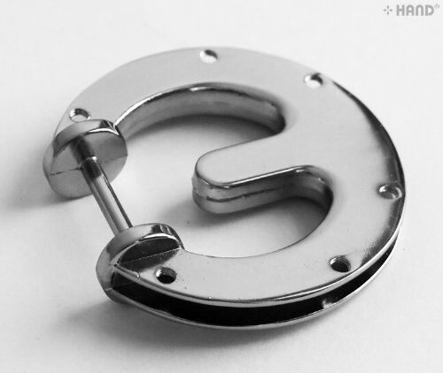 Close-up of the 65mm diameter decorative handbag buckle.