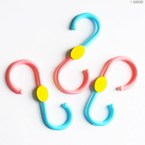 Pack of 6 plastic S-shaped swivel hooks displayed together