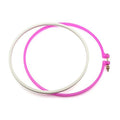 25cm pink plastic embroidery hoop on a white background