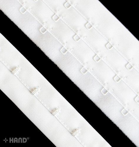 Close-up of fleeced nylon bra hook and eye tape, 5 metres long.