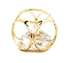 Close-up view of gold coloured rounded cube pendant