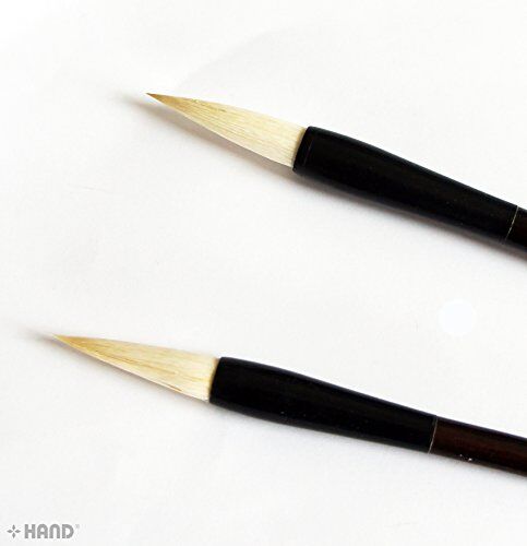 Brushes displayed on a textured surface for contrast