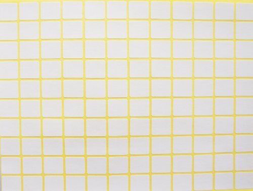 Smooth white self-adhesive labels on a sheet.