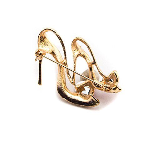 Close-up of elegant high heel shoes brooch showcasing intricate details.