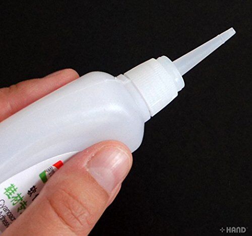 B502 Super Glue in use on a shoe repair project