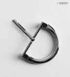 Close-up of the 44x30mm D shape belt buckle showing its shine