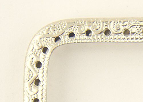 Side view of the silver tone coin purse frame