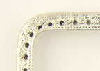 Side view of the silver tone coin purse frame
