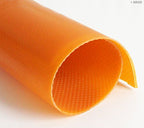 Rubber mat placed on a knee for easy cutting and repairing.