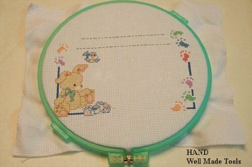 Cross Stitch Hoop displayed with colourful threads