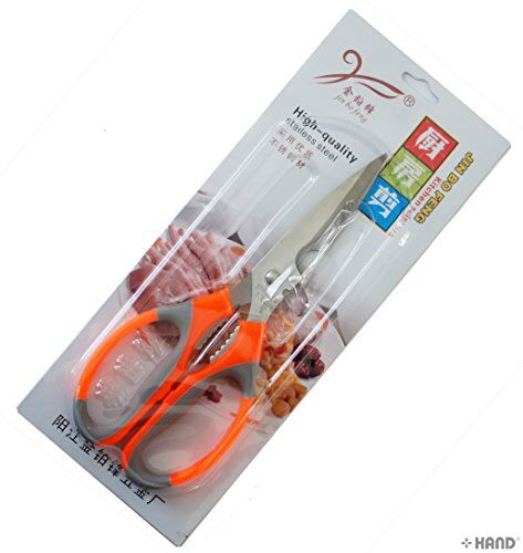 Scissors displayed with a measuring tape for size reference