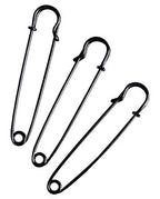 Three extra large dark copper kilt pins on a white background.