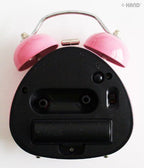 Alarm clock displaying time with a vibrant colour scheme