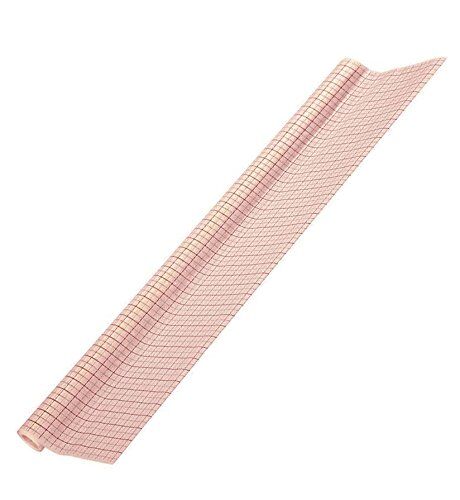 Roll of white pattern cutting tracing paper with red grid.