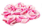 Close-up of two-tone pink ribbon and organza embellishments.