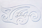 Close-up of French curve showing smooth edges for pattern drafting