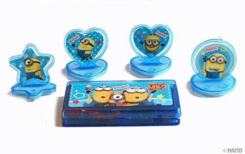 Child using a Minion rubber stamp on colourful paper