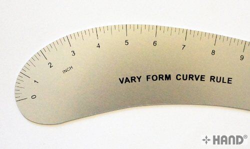 Close-up of the aluminium curve ruler showing its precise measurements.
